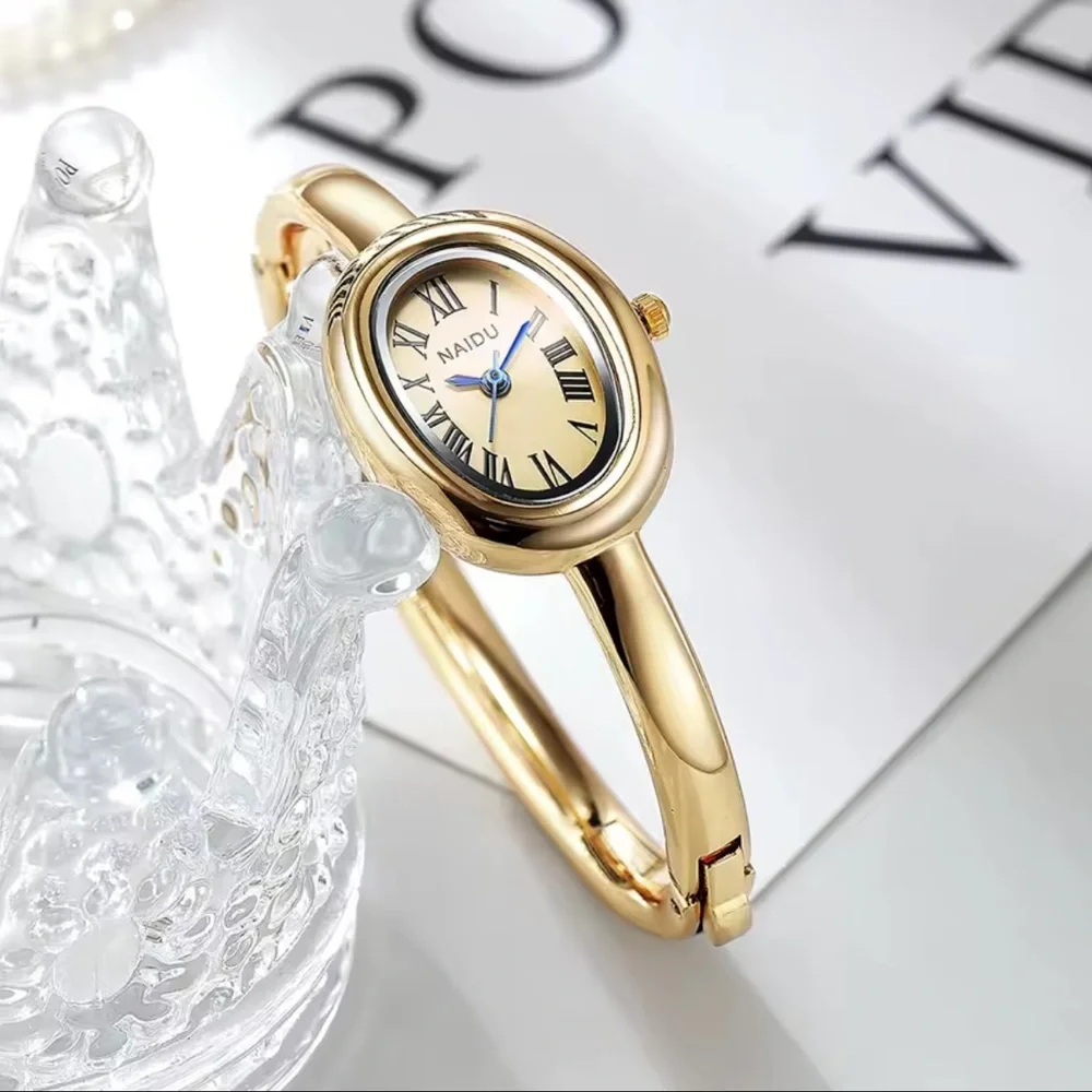 Anthropologie Gold Oval Bangle Watch with White Dial